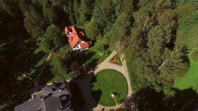 Healthy lifestyle in summer villa. Shooting from a helicopter, the suburban real estate