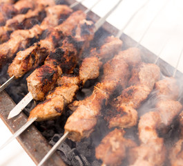 Shish kebab fry on the grill in winter