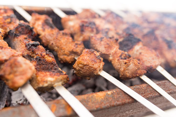 Shish kebab fry on the grill in winter