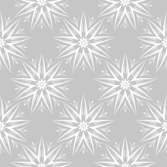 White flowers on gray background. Ornamental seamless pattern