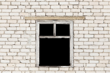 Windows in a brick house under construction