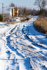 Footprints from a car in the snow