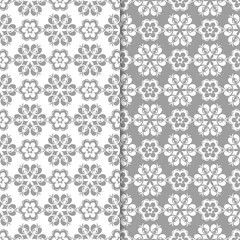 Poster Im Rahmen White and gray floral backgrounds. Set of seamless patterns © Liudmyla