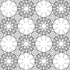 A pattern of circles in contrasting colors. Black and white seamless geometric pattern