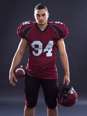 American Football Player isolated on gray © .shock