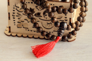 Old wooden mala beads, essential accessory for meditation or mindfulness.