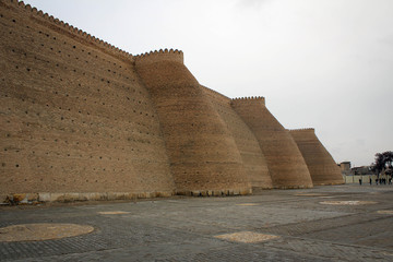 Fototapeta na wymiar Walls and gates of Ark Fortress of ancient Bukhara, Uzbekistan