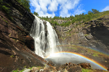 Beautiful waterfall and rainbow in Norway