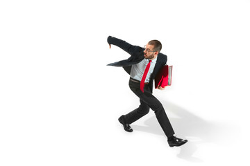 Businessman running with a folder on white background