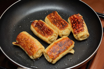 pancakes stuffed in a frying pan