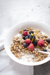 Healthy breakfast with cereals, rice milk and berries