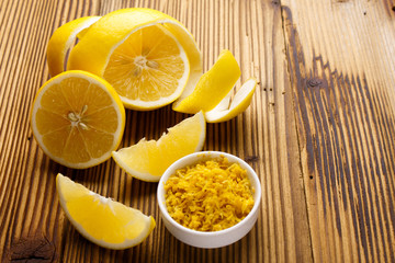 Fototapeta na wymiar Lemon and juice on a wooden background