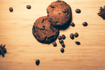 Round chocolate cookies with anise and coffee beans