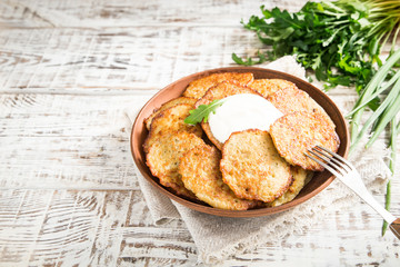 Draniki - potato fritters. potato pancakes. The naitonal dish of Belarus, Ukraine and Russia.