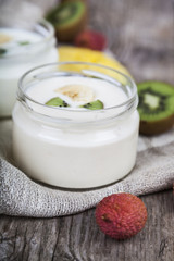 Obraz na płótnie Canvas Yogurt with tropical fruits