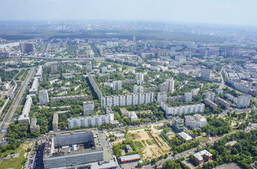 Fototapeta na wymiar Top view of big city in the summer.