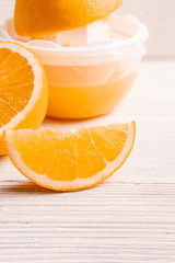 oranges and juice on a white background