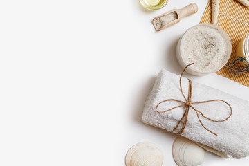 Wellness and spa threatment products on white paper background. Space for text.