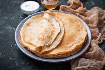 Pancakes crepes with different jam and cream