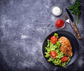 Grilled chicken breast with vegetable salad