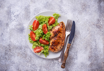 Grilled chicken breast with vegetable salad