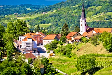 Keuken spatwand met foto Picturesque town of Klanjec in green landscape view © xbrchx