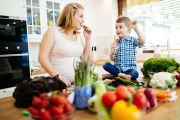 Mother and child preparing lunch