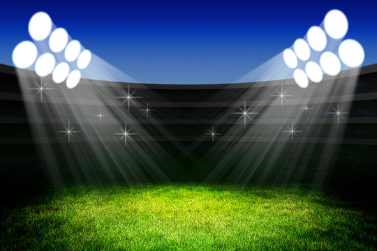 Sport event celebration ceremony concept, light of spotlights on the green grass field of the stadium arena