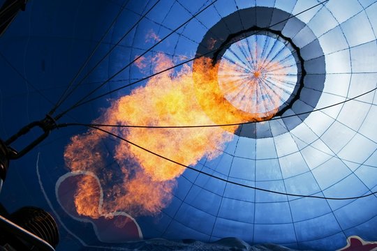 Hot air balloon being heated with a flame, Montgolfiade Bad Wiessee, Tegernsee, Bavaria, Germany, Europe