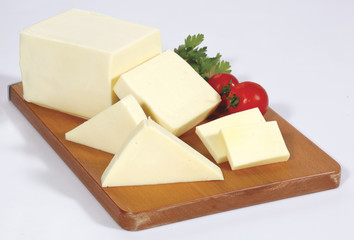 cheese on wooden board isolated on white
