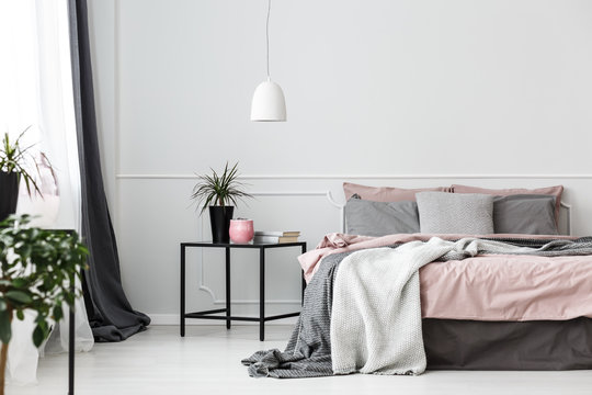 Grey and pink bedroom interior