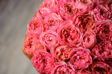 Top view photo of bouquet of bright pink peony rose