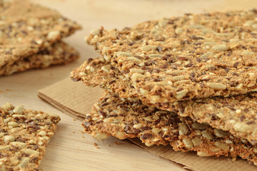 Crispy flatbread cracker with flax, sunflower and sesame seeds