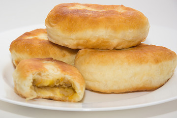 Home fried patties with cabbage.