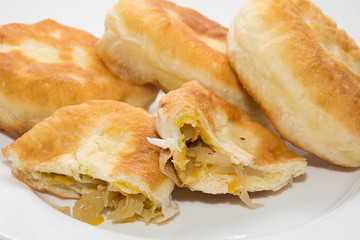 Home fried patties with cabbage.