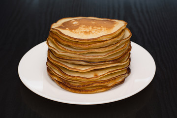 Pancakes in powdered sugar.
