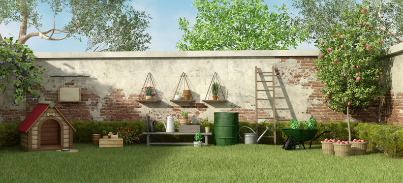 Garden with dog house and gardening tools