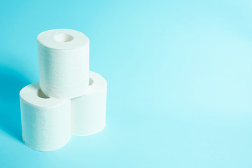 Daily necessities, Toilet paper. copy space, light blue background.　日用品　トイレットペーパー　余白あり　水色背景