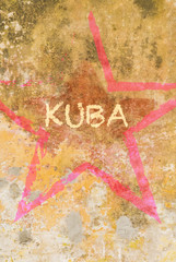 Red kubas star on the yellow wall