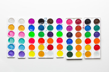 sets of used watercolor paints