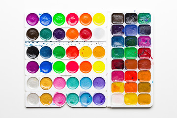 sets of used watercolor paints