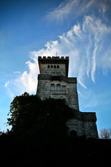 Fototapeta premium tower on background of blue sky and clouds