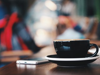 close up coffee cup in coffee shop.