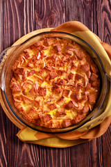 Leftover sponge cake pudding in a glass tin