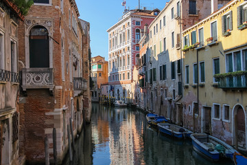 Narrow water street of historic center of Venice, Italy