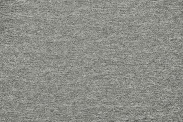 Fototapeta na wymiar Classic sample of machine knitting. Grey textile background.