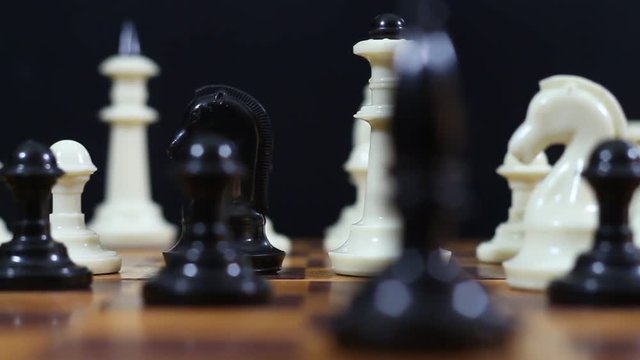 Game of chess. Friends in the competition play chess. World Chess Tournament. Victory and defeat. Checkmate. Bracing. King and Queen.