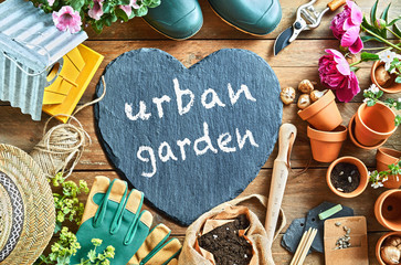 Urban Garden concept handwritten on a slate heart