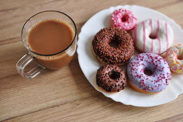 delicious coffee and delicious donuts