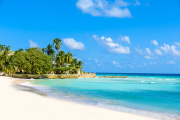 Fototapeta na wymiar Dover Beach - tropical beach on the Caribbean island of Barbados. It is a paradise destination with a white sand beach and turquoiuse sea.